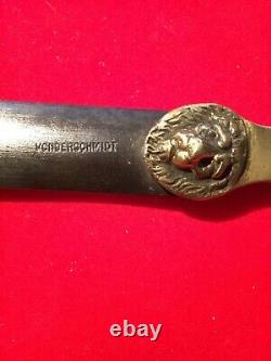 ANTIQUE 1800s BRASS HANDLE WITH LION HEAD KNIFE SHARPENER by VONDERSCHMIDT