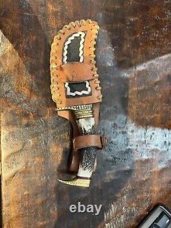 BW cumtom knife, damascus blade, stag handle, brass trim with leather sheath