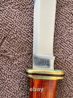 Buck Knife 102 Woodsman, Fixed blade / Cocobolo/Brass Handle with 102 Sheath