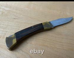 Buck Knife 110/USA Lockback Stainless Steel Walnut/Brass 3 Pin Handle 3.75 Blade