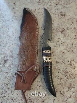 Damascus knife Fixed Blade W / Hide Sheath Horn & brass Handle nicely made heavy