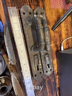 Heavy brass door handles made of antique Russian imperial