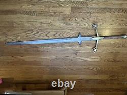 Sword 56 length handle made out of solid brass and wood